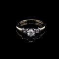 18ct Gold Three Stone Brilliant and Princess cut Diamond Ring