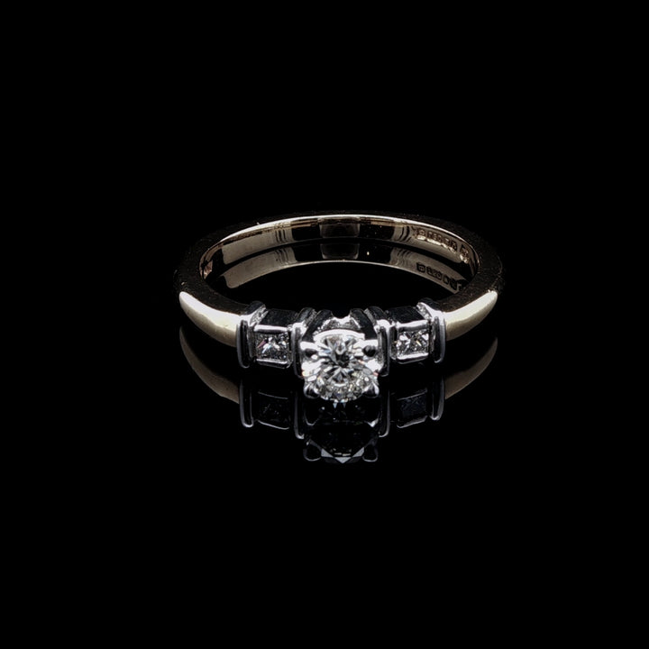 18ct Gold Three Stone Brilliant and Princess cut Diamond Ring