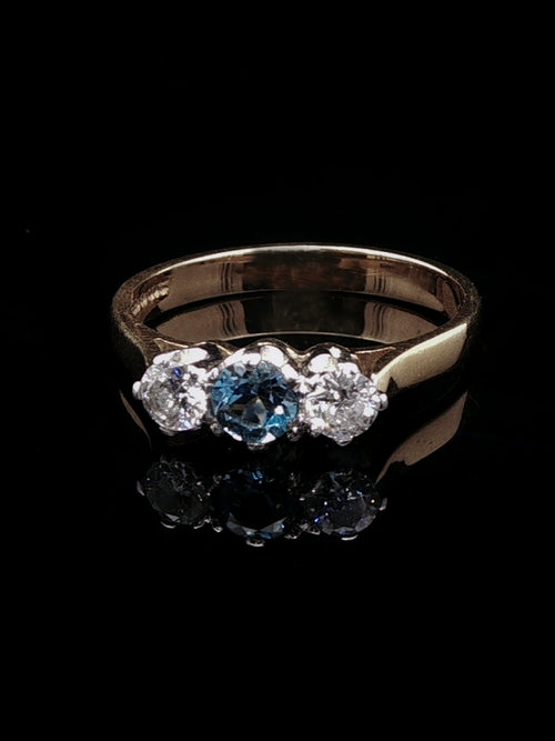 18ct Gold 0.30ct Diamond and Aquamarine Three Stone Ring,London 1989