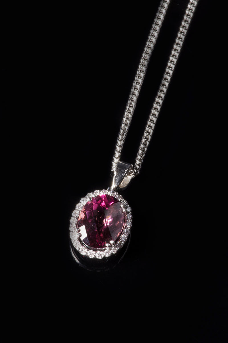 18ct White Gold Pink Tourmaline Pendant with a Diamond Halo