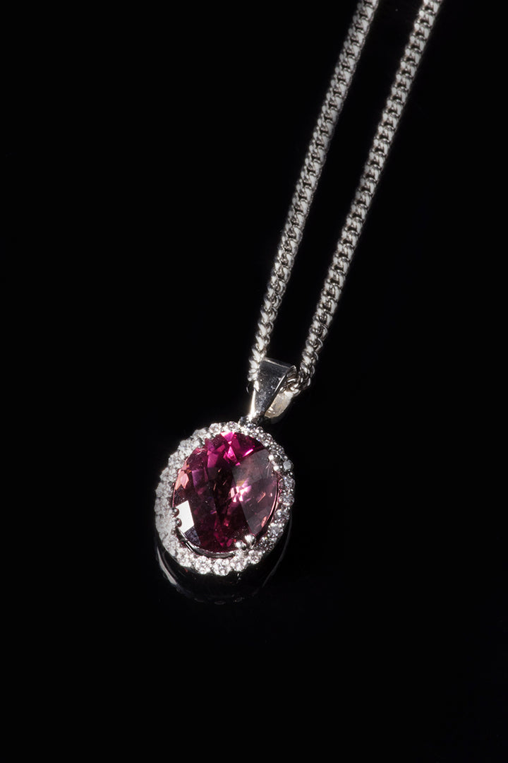 18ct White Gold Pink Tourmaline Pendant with a Diamond Halo