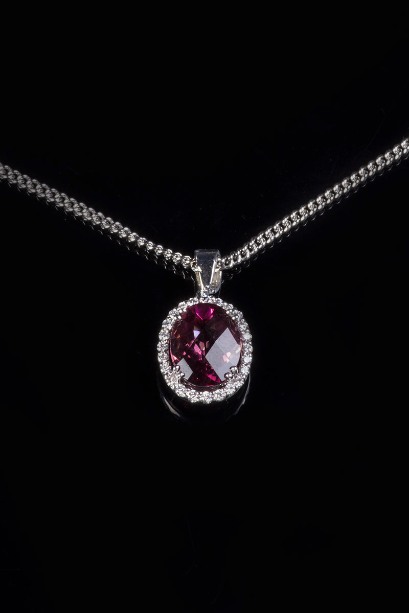 18ct White Gold Pink Tourmaline Pendant with a Diamond Halo