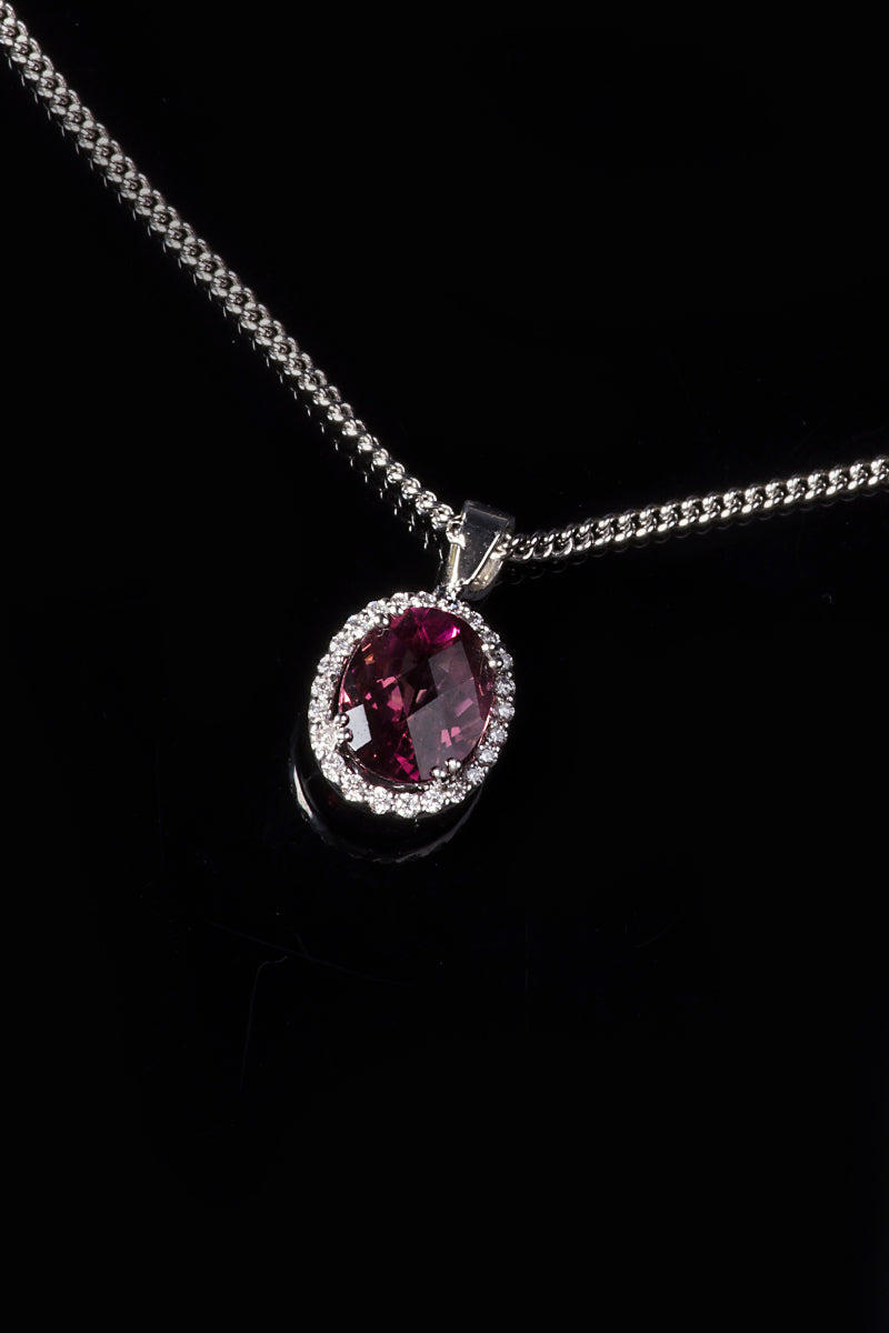18ct White Gold Pink Tourmaline Pendant with a Diamond Halo