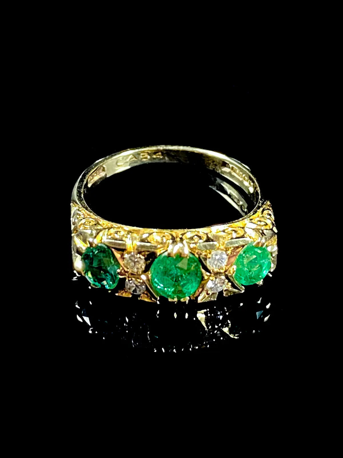 18ct Yellow Gold Emerald and Diamond Seven Stone Ring