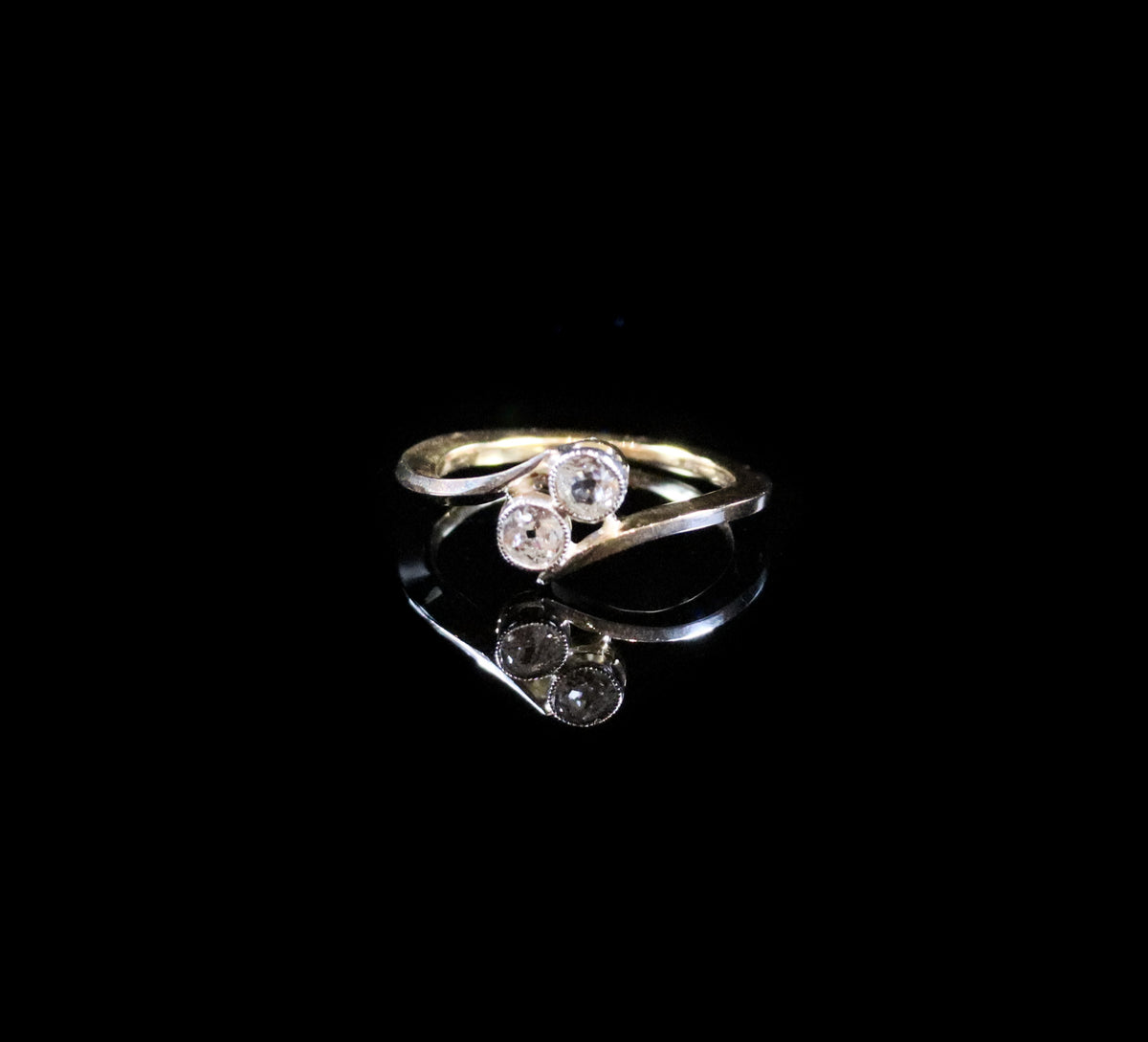 18ct Gold Two Stone Old Cut Diamond Twist Ring