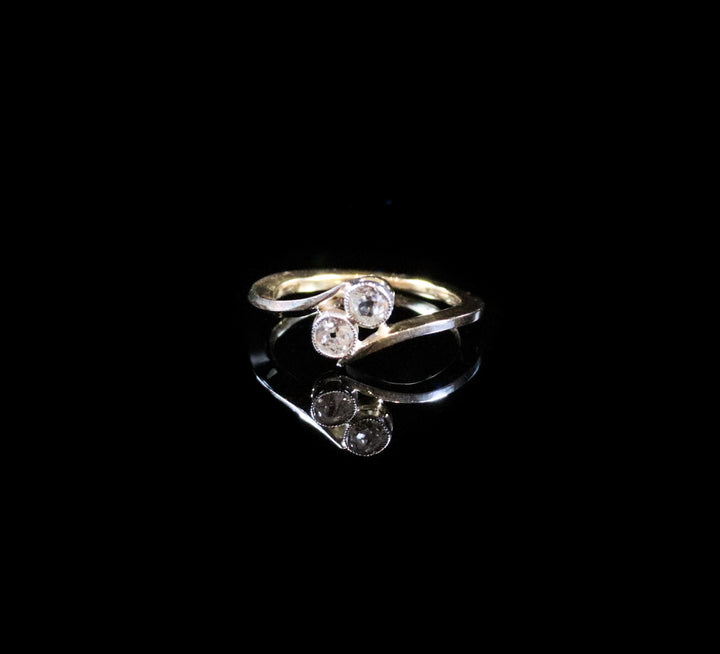 18ct Gold Two Stone Old Cut Diamond Twist Ring