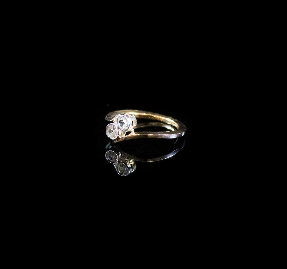 18ct Gold Two Stone Old Cut Diamond Twist Ring
