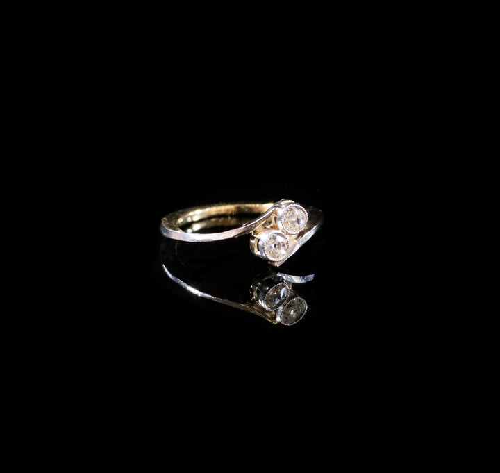 18ct Gold Two Stone Old Cut Diamond Twist Ring