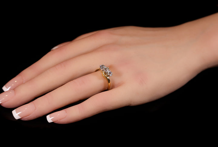 18ct Gold Three Stone Diamond Twist Ring