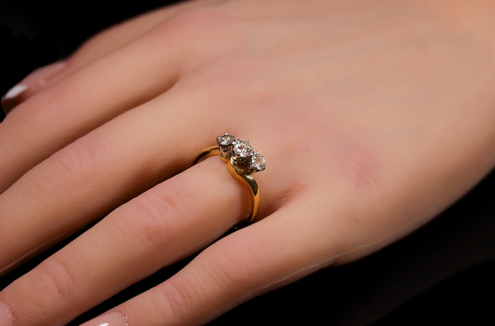 18ct Gold Three Stone Diamond Twist Ring