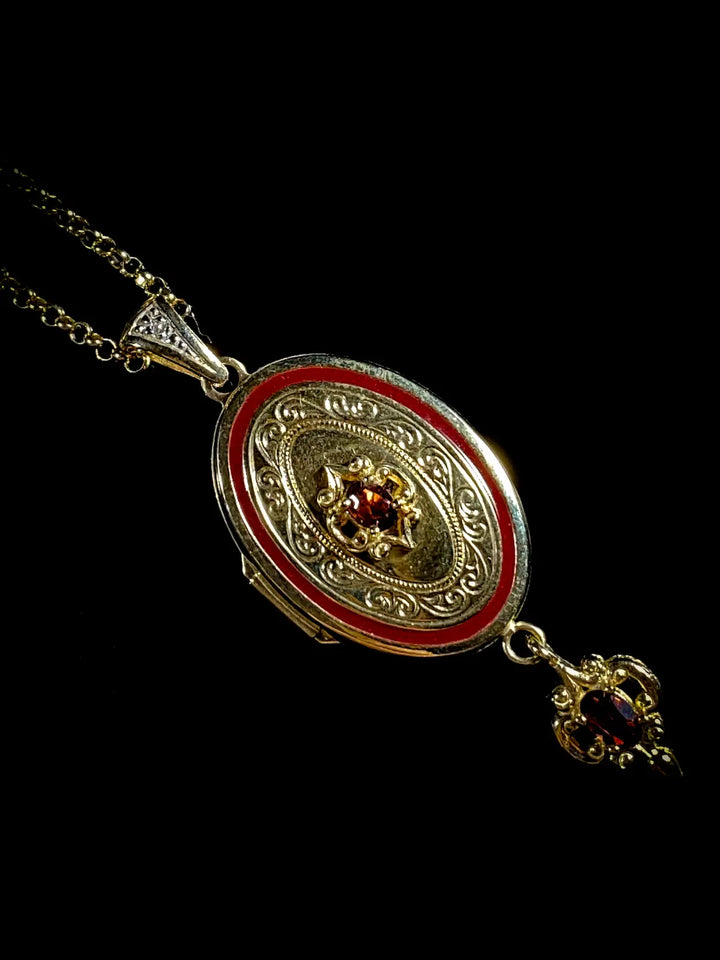 14ct Gold Royal Doulton Limited Addition Garnet Locket