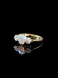 18ct Gold and Platinum Oval Opal and Diamond Three Stone Ring