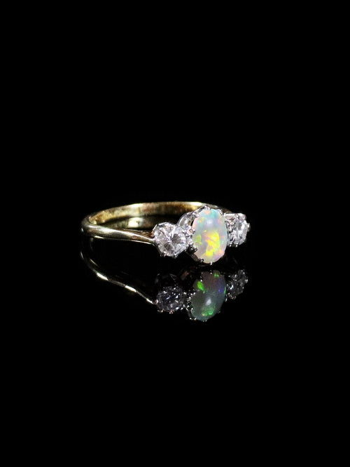 18ct Gold and Platinum Oval Opal and Diamond Three Stone Ring