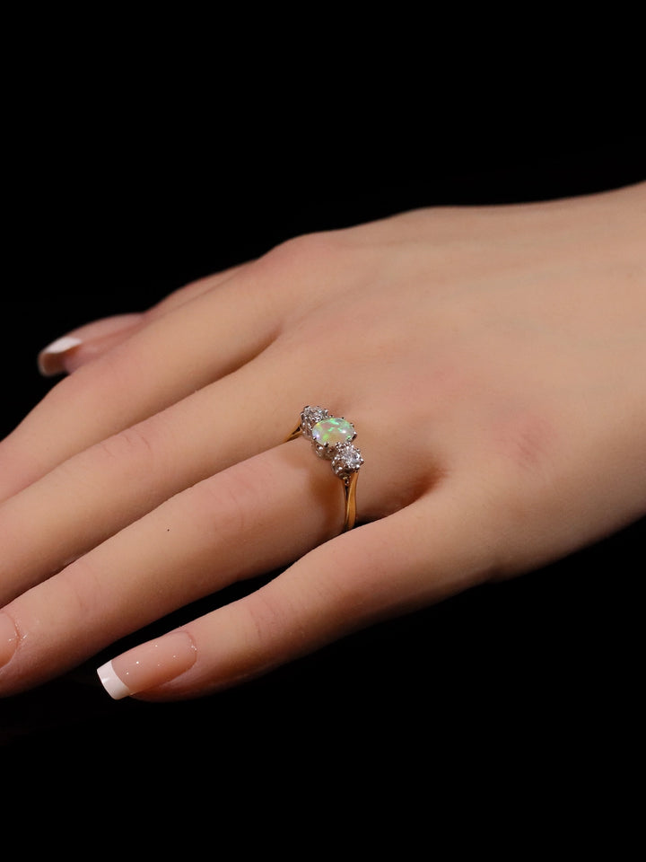 18ct Gold and Platinum Oval Opal and Diamond Three Stone Ring