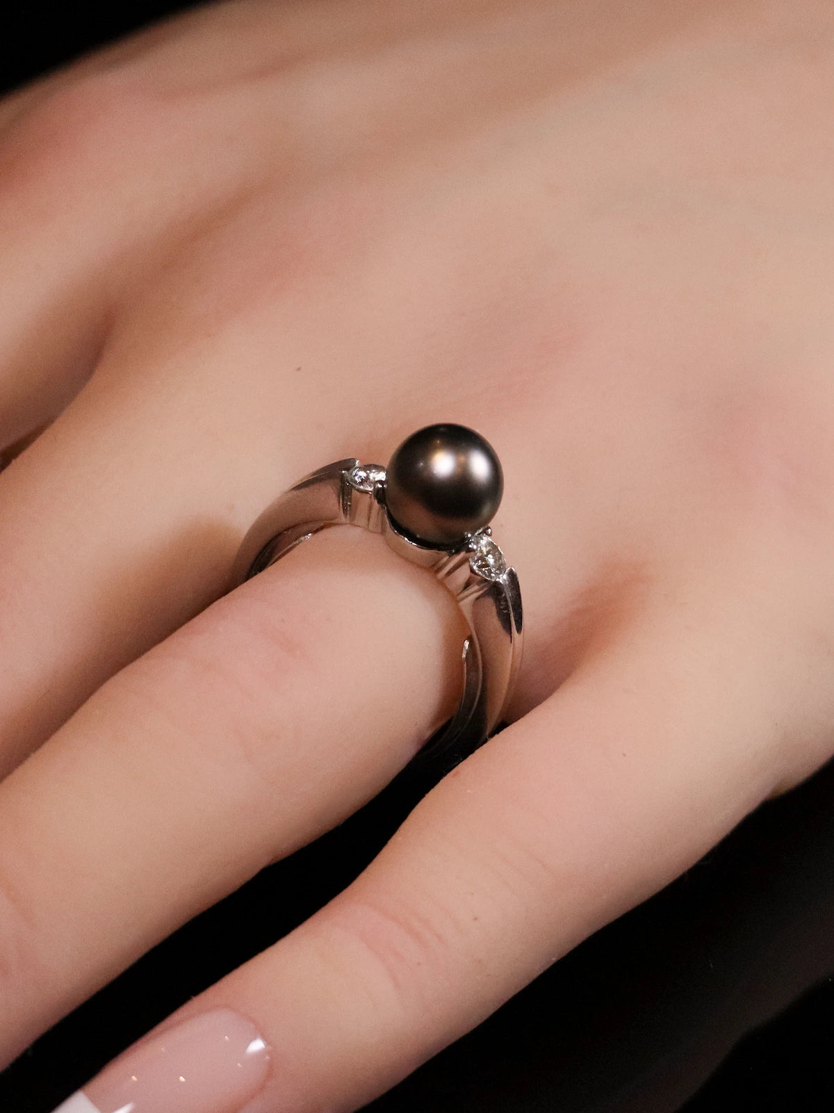 18ct White Gold Diamond and Black Pearl Three Stone Ring