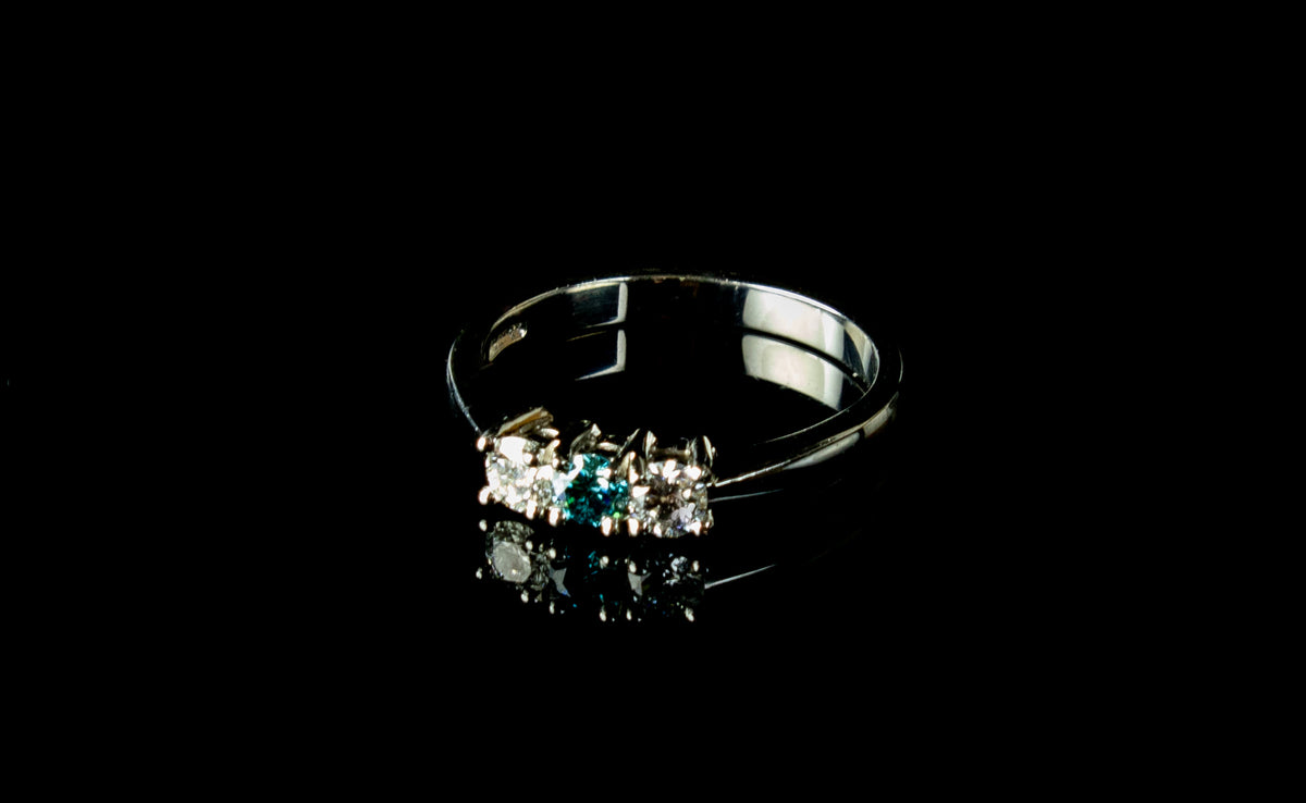 Three Stone Blue Zircone and Diamond Ring set in Platinum