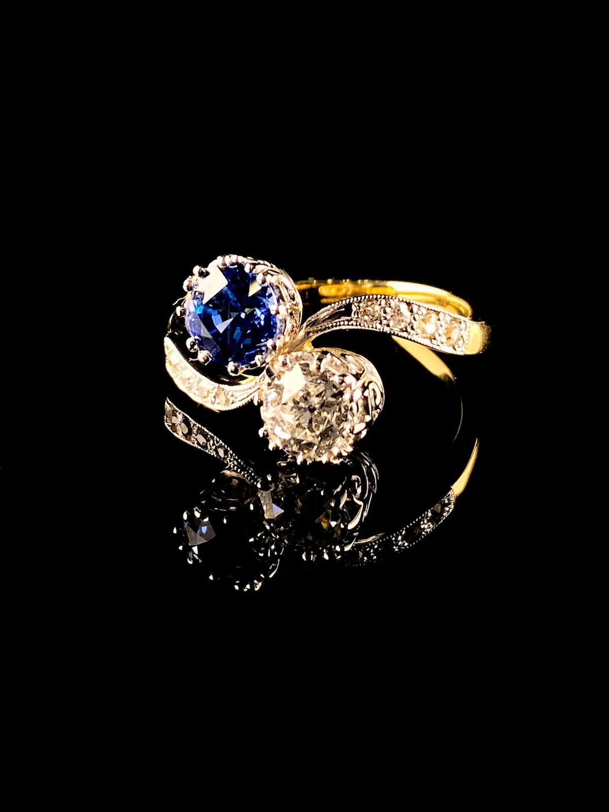 18ct Gold and Platinum Two Stone 1.13ct Sapphire and Old Cut Diamond Crossover Ring
