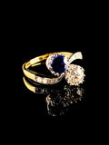 18ct Gold and Platinum Two Stone 1.13ct Sapphire and Old Cut Diamond Crossover Ring