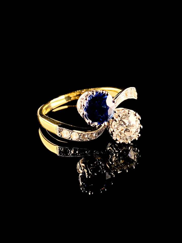 18ct Gold and Platinum Two Stone 1.13ct Sapphire and Old Cut Diamond Crossover Ring