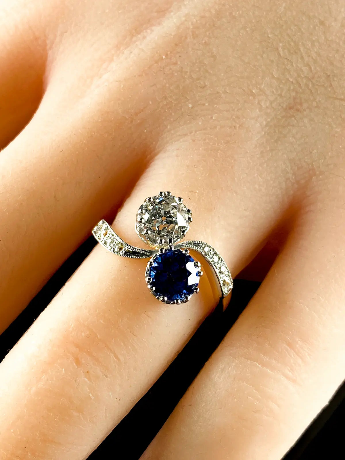 18ct Gold and Platinum Two Stone 1.13ct Sapphire and Old Cut Diamond Crossover Ring