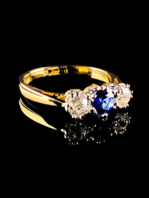 18ct Gold and Platinum 0.56ct Sapphire and Old Cut 0.62ct Diamond Three Stone Ring