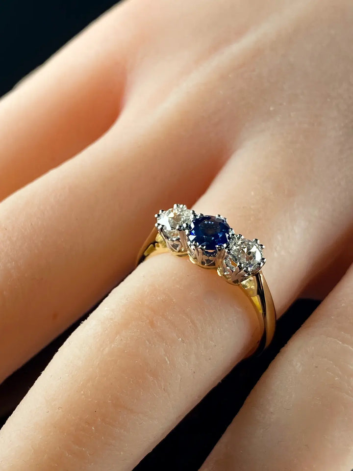 18ct Gold and Platinum 0.56ct Sapphire and Old Cut 0.62ct Diamond Three Stone Ring