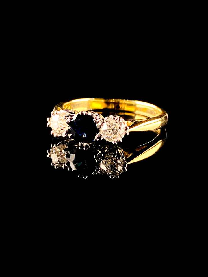 18ct Gold and Platinum 0.58ct Sapphire and Old Cut Diamond Three Stone Ring