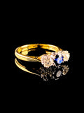 18ct Gold and Platinum 0.58ct Sapphire and Old Cut Diamond Three Stone Ring