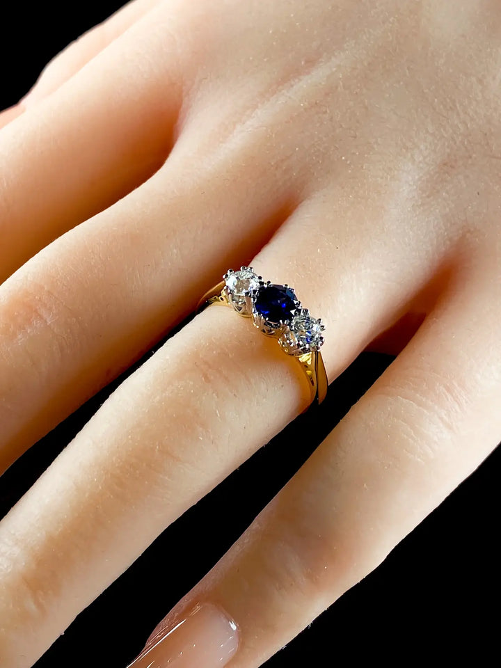 18ct Gold and Platinum 0.58ct Sapphire and Old Cut Diamond Three Stone Ring