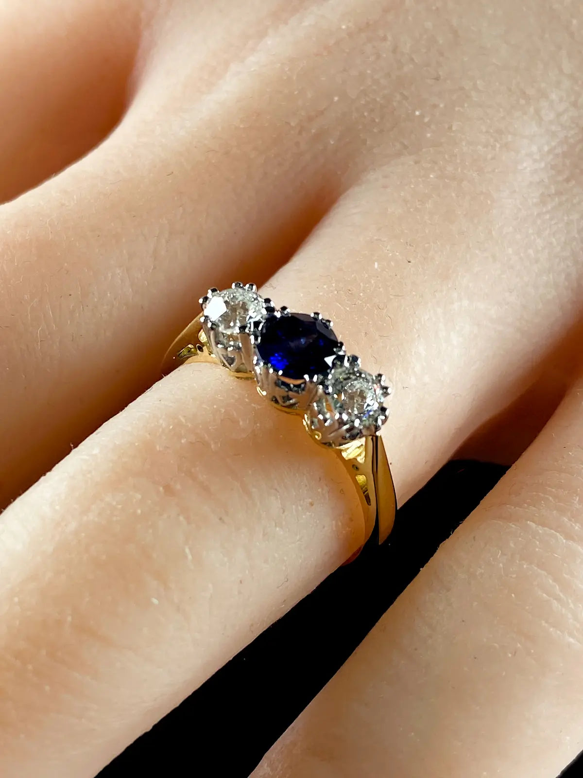 18ct Gold and Platinum 0.58ct Sapphire and Old Cut Diamond Three Stone Ring