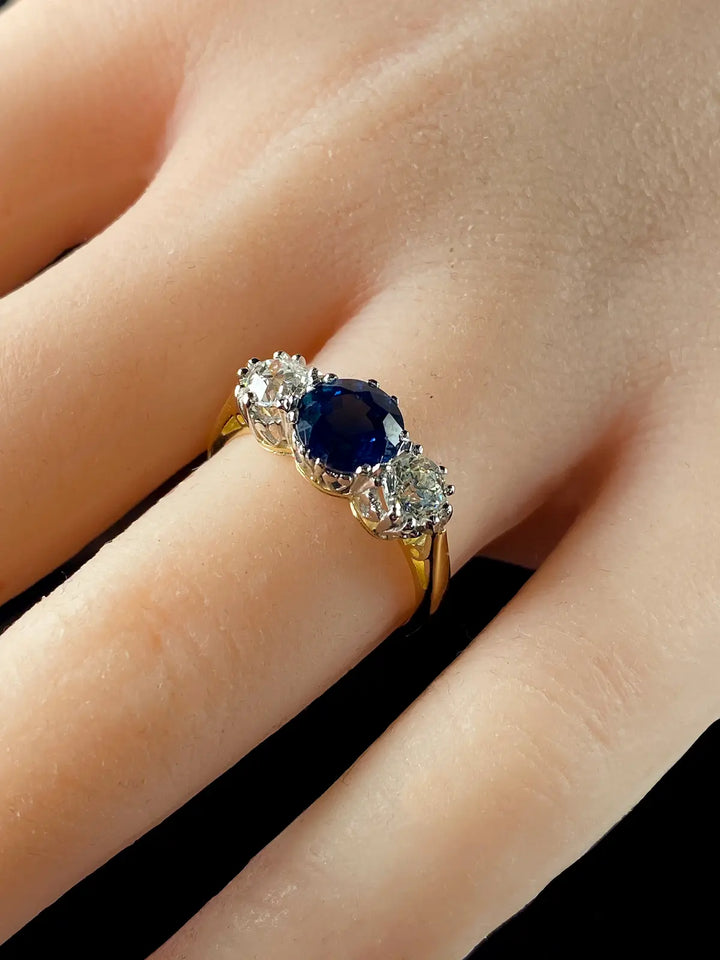 18ct Gold and Platinum 1.67ct Sapphire and Old Cut Diamond Three Stone Ring