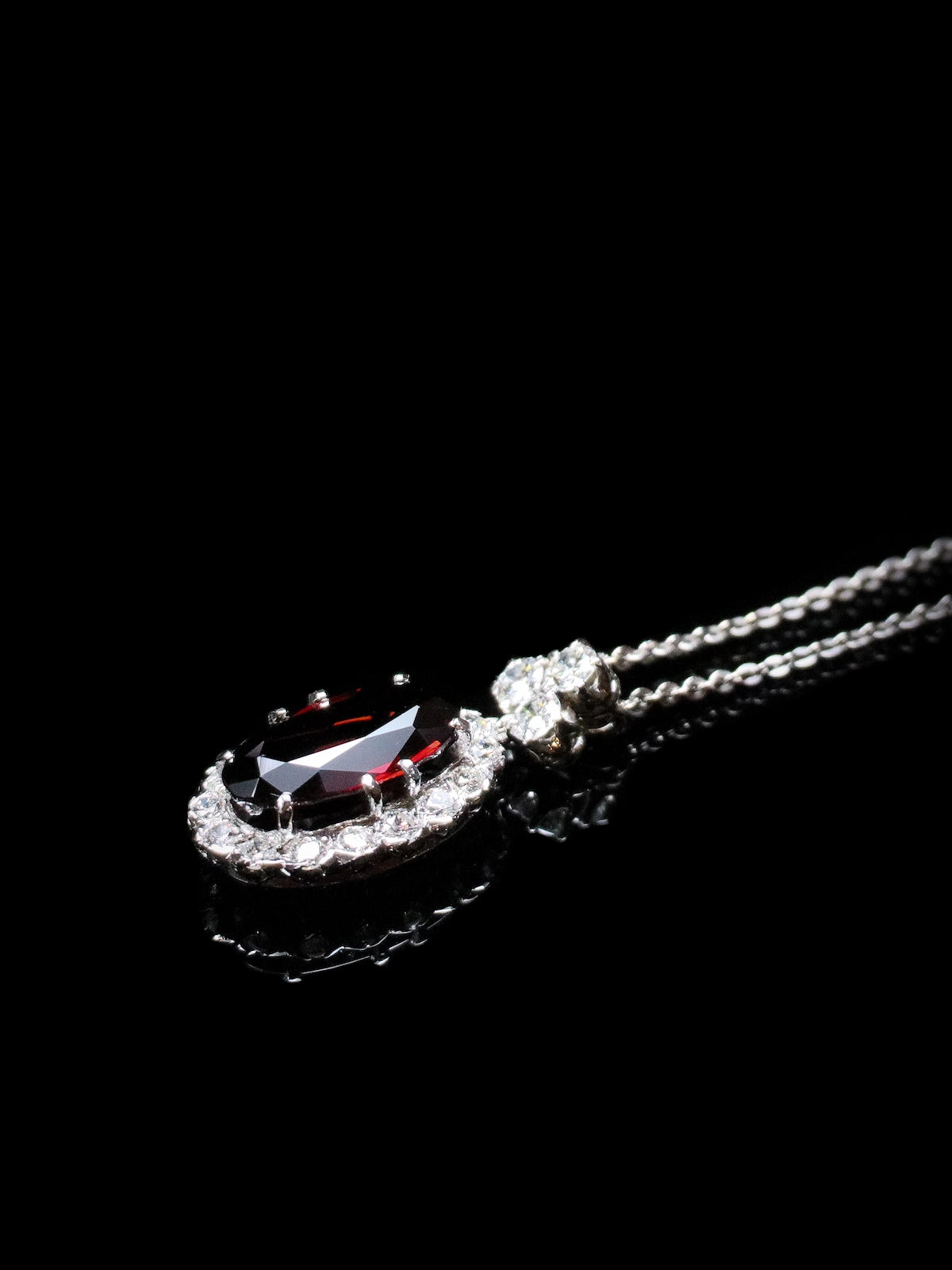 18ct Garnet and Diamond Cluster Pendant with a Diamond Trefoil