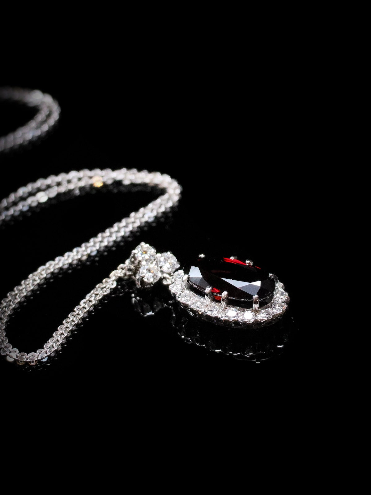18ct Garnet and Diamond Cluster Pendant with a Diamond Trefoil