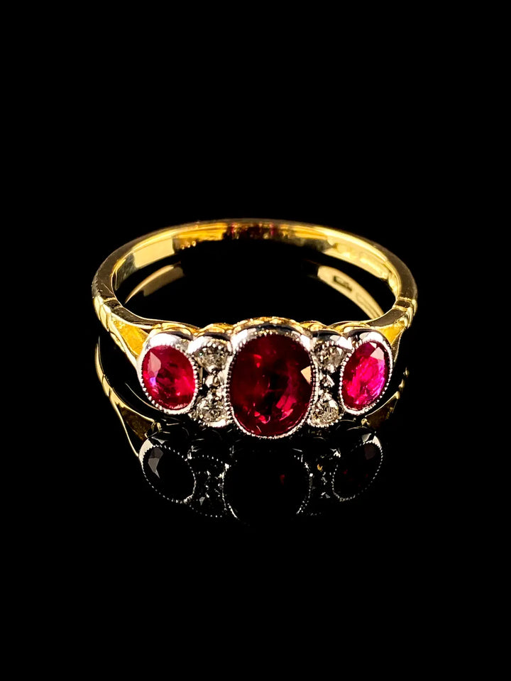 18ct Gold and Platinum Seven Stone 1.30ct Ruby and Diamond Ring