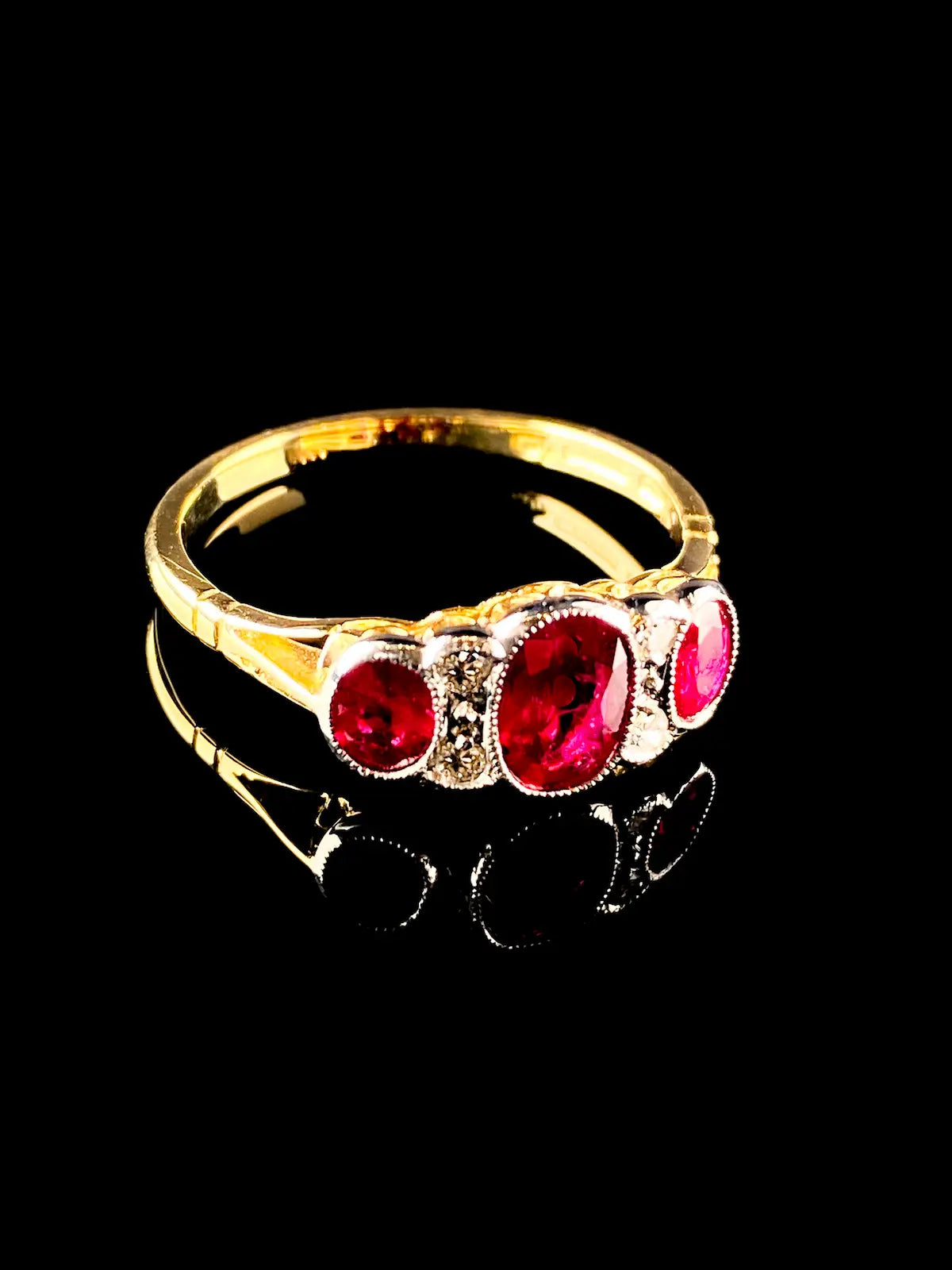 18ct Gold and Platinum Seven Stone 1.30ct Ruby and Diamond Ring