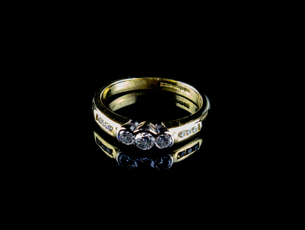 18ct Gold Three Stone Diamond Ring with Diamond Set Shoulders