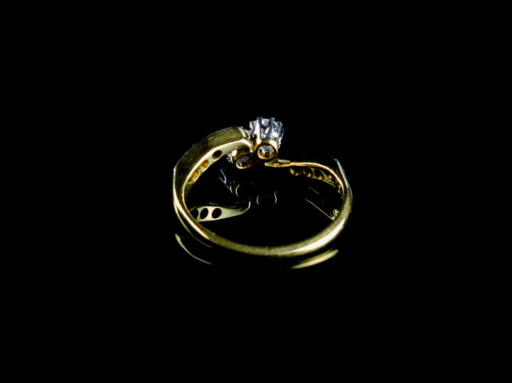 1930s 18ct Gold and Platinum Two Stone Diamond Twist Ring