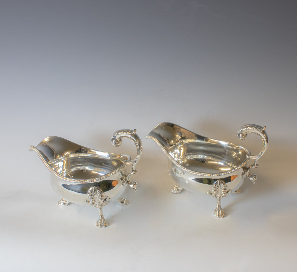 Impressive pair of antique George II sauce boats