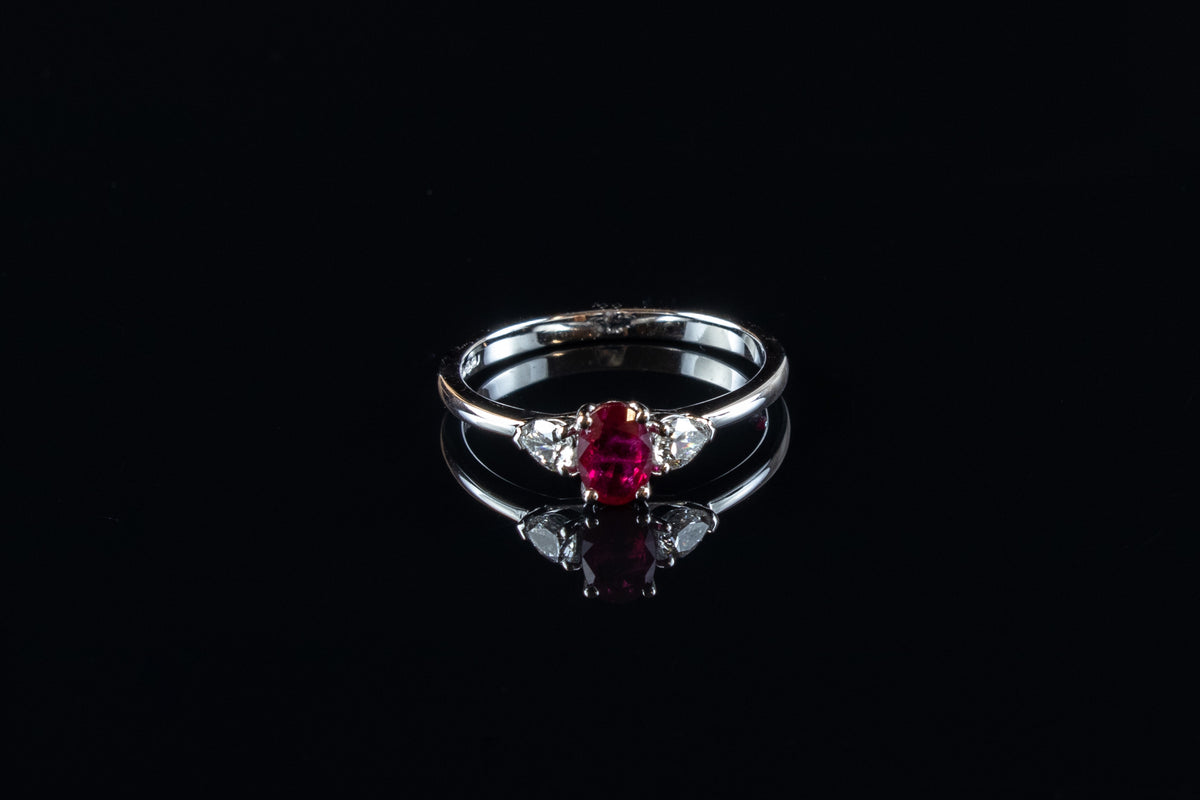 18ct White Gold Ruby and Pear-Cut Diamond Three Stone Ring