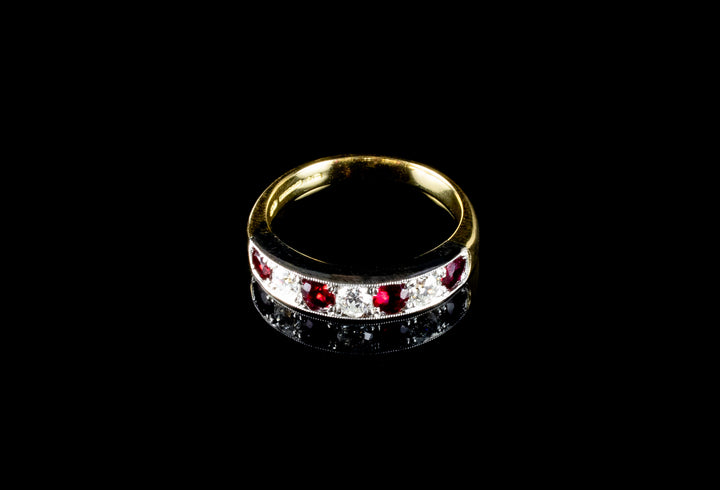 18ct Gold and Platinum Seven Stone Ruby and Old Cut Diamond Half Eternity Ring