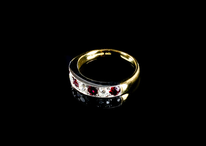 18ct Gold and Platinum Seven Stone Ruby and Old Cut Diamond Half Eternity Ring