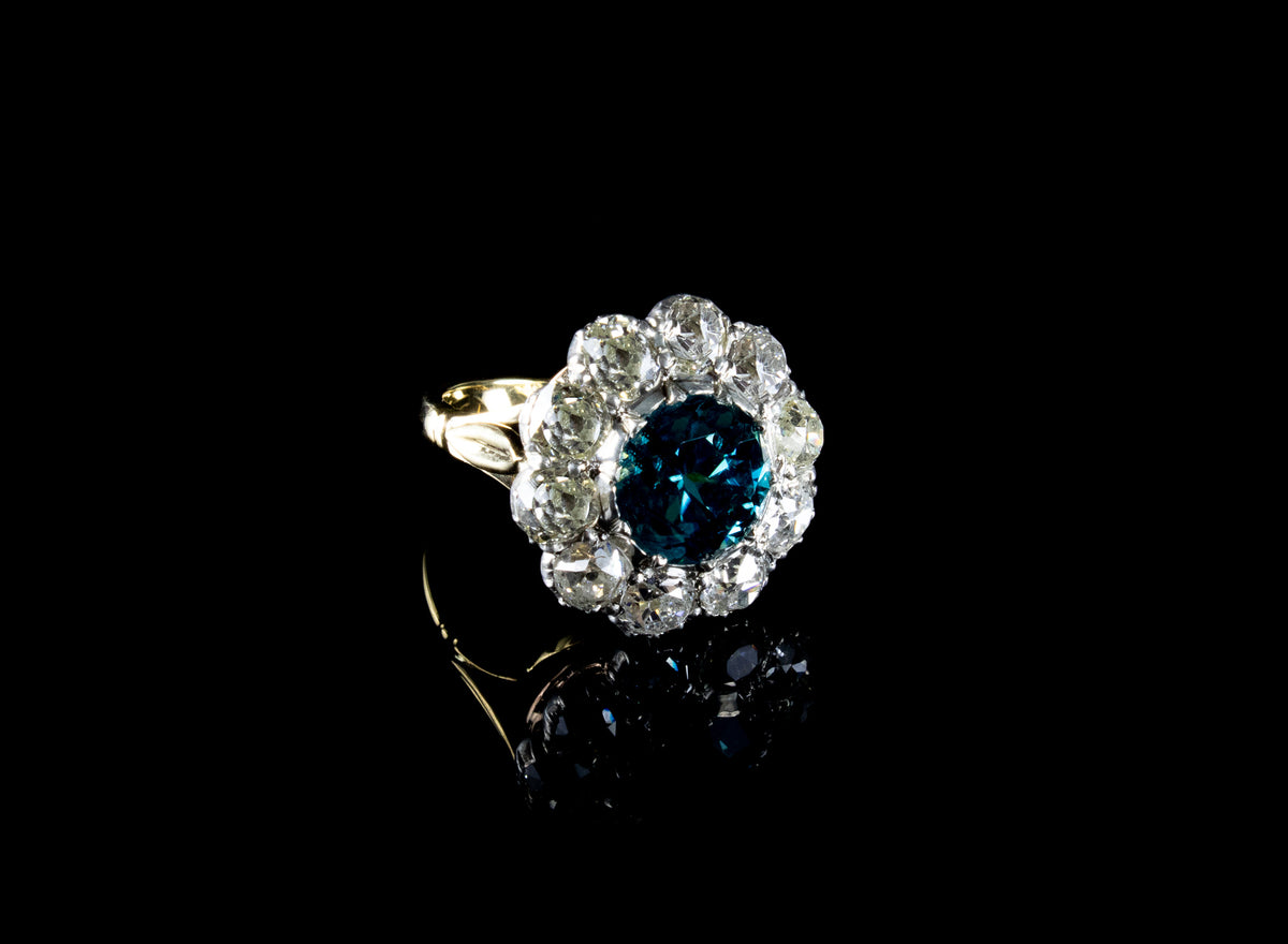 Impressive 18ct Gold and Silver Blue Zircon and Old Cut Diamond Cluster Ring