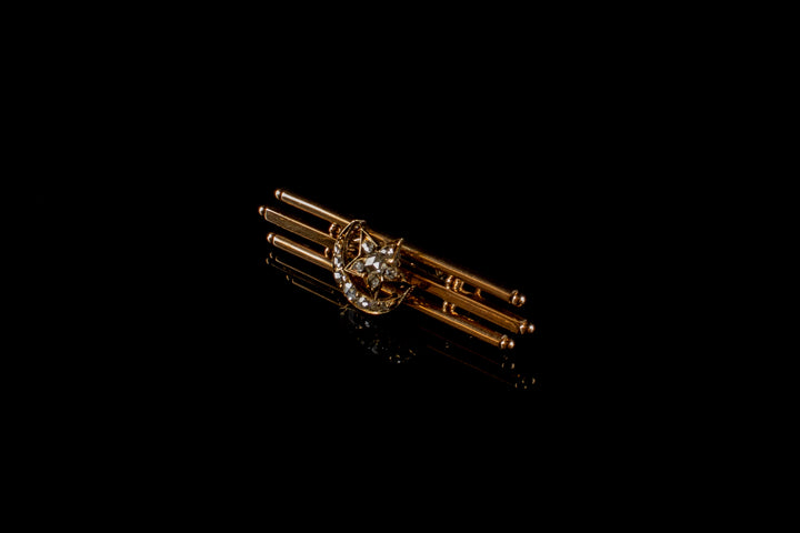 Yellow gold diamond crescent and star brooch