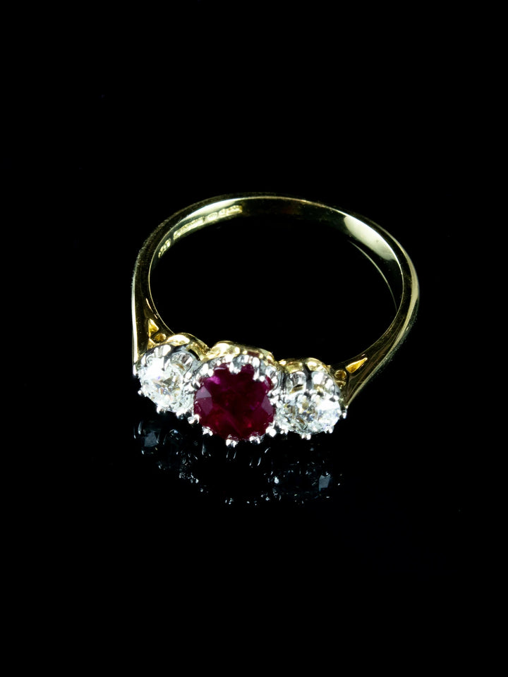 18ct Gold and Platinum Three Stone Old European Cut Diamond and 1.32ct Ruby Ring