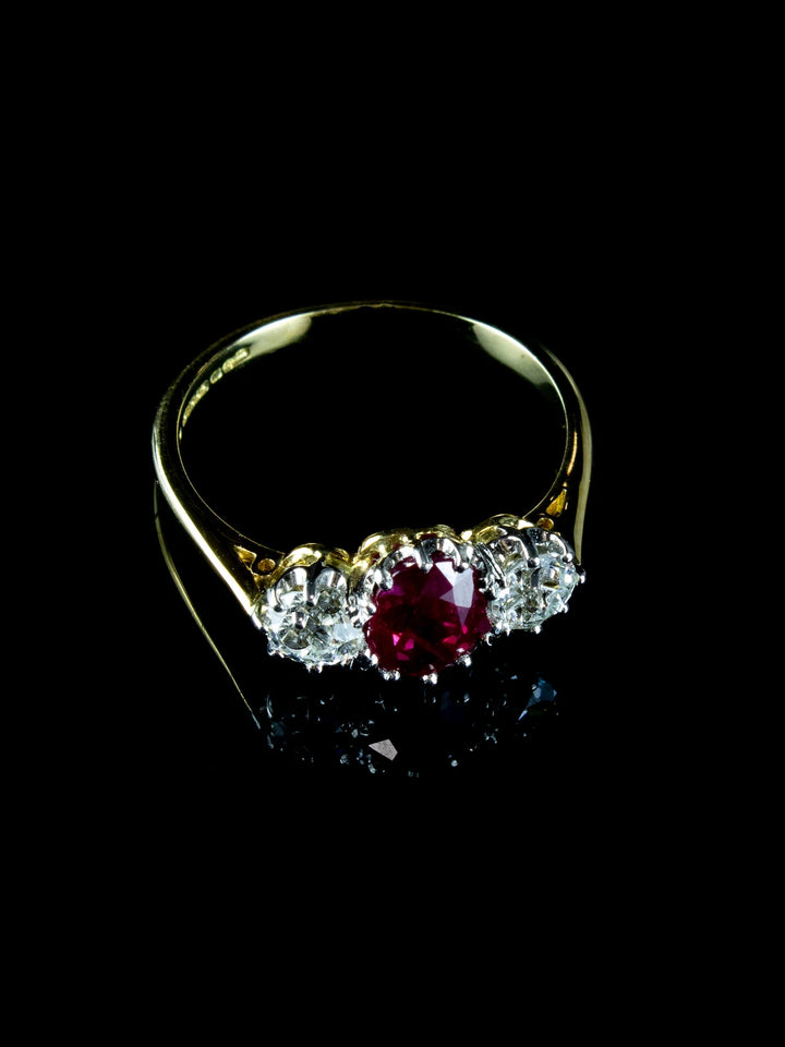 18ct Gold and Platinum Three Stone Old European Cut Diamond and 1.32ct Ruby Ring