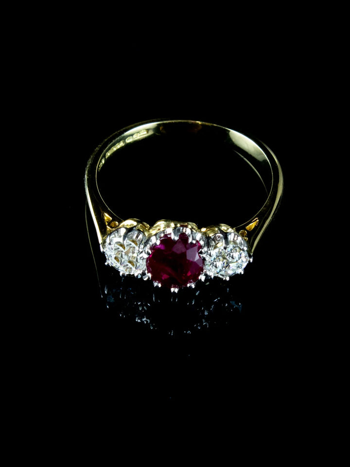18ct Gold and Platinum Three Stone Old European Cut Diamond and 1.32ct Ruby Ring