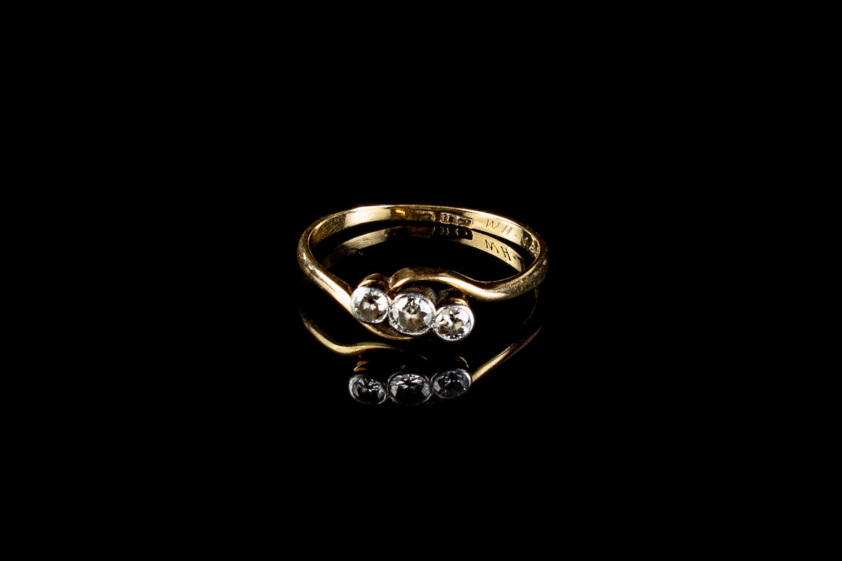 18ct Gold Three Stone Diamond Twist Ring