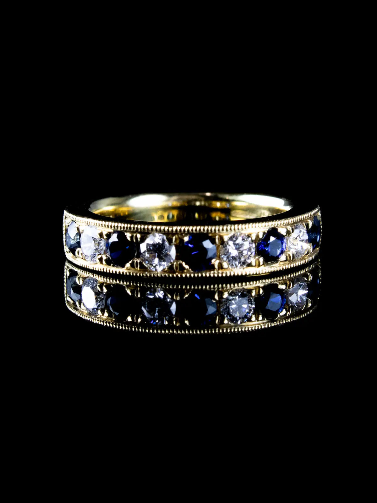 18ct Gold 0.75ct Sapphire and 0.43ct Diamond Half Eternity Ring