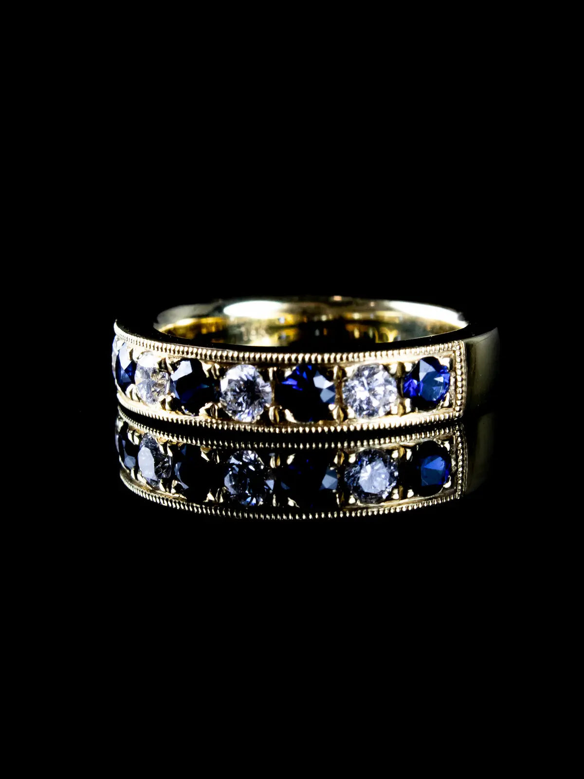 18ct Gold 0.75ct Sapphire and 0.43ct Diamond Half Eternity Ring