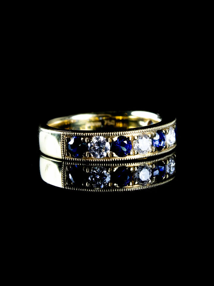 18ct Gold 0.75ct Sapphire and 0.43ct Diamond Half Eternity Ring